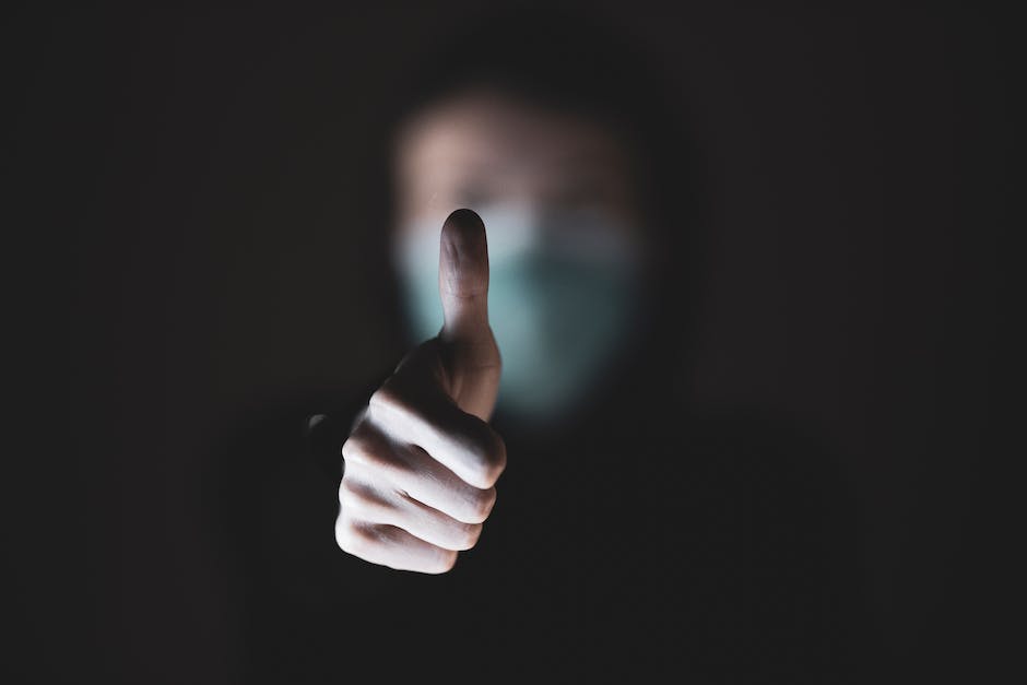 Illustration of a computer screen with a thumbs up symbol, representing a positive online reputation